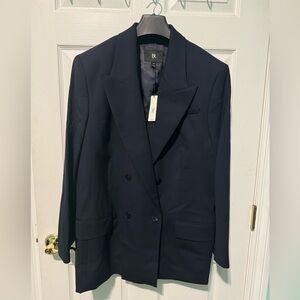Navy Blue jacket from Banana Republic. Size 20. Brand new. With tags. Ordered BR